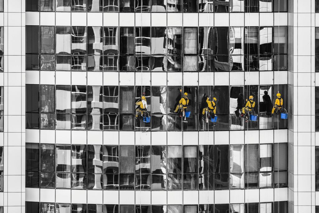 pexels-photo-625279-625279 High-rise window cleaners in Dubai cleaning a skyscraper, showcasing urban architecture.